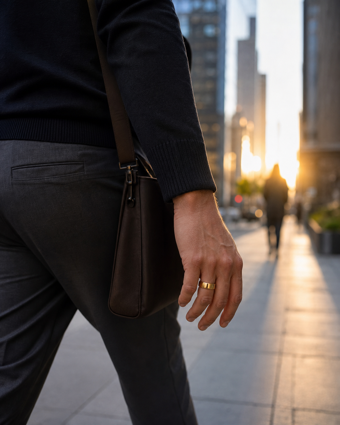 Person walking to work wearing the LazyGdgets R09 gold smart ring